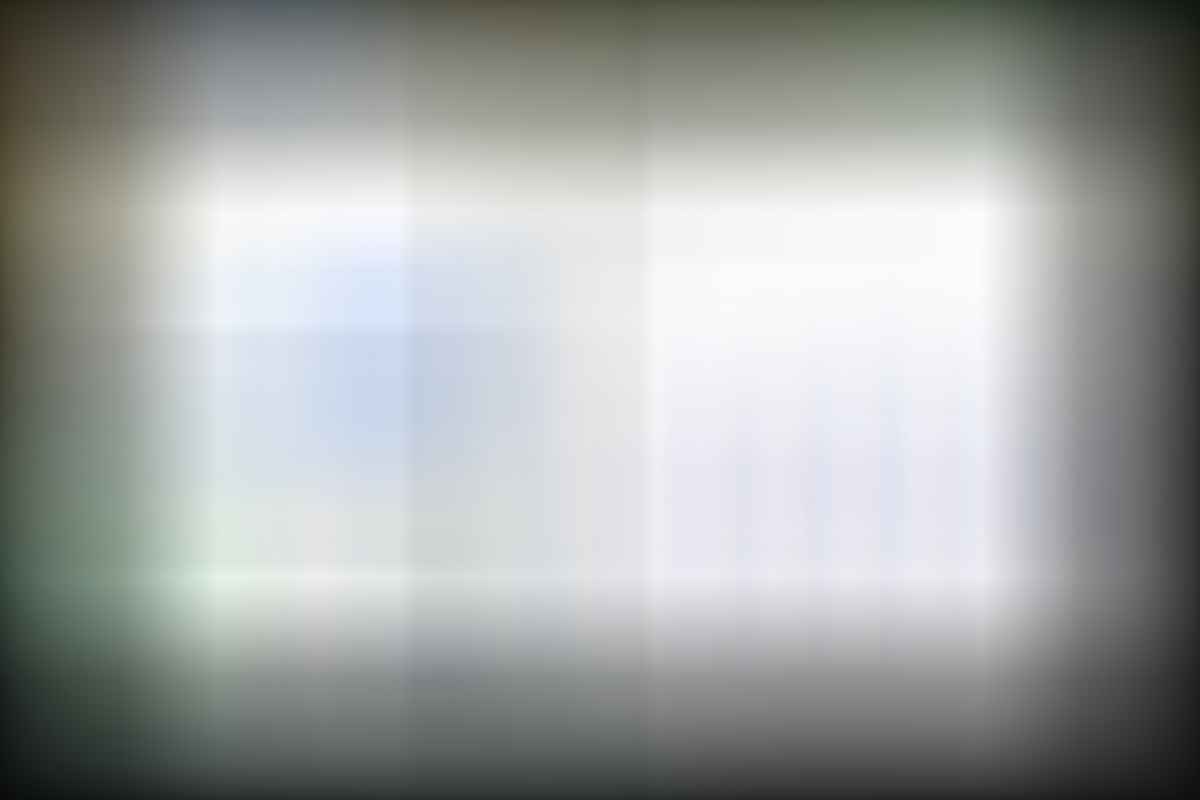 DemandQ energy management dashboard UI with chart-based electricity savings analytics and EV charging monitoring interface